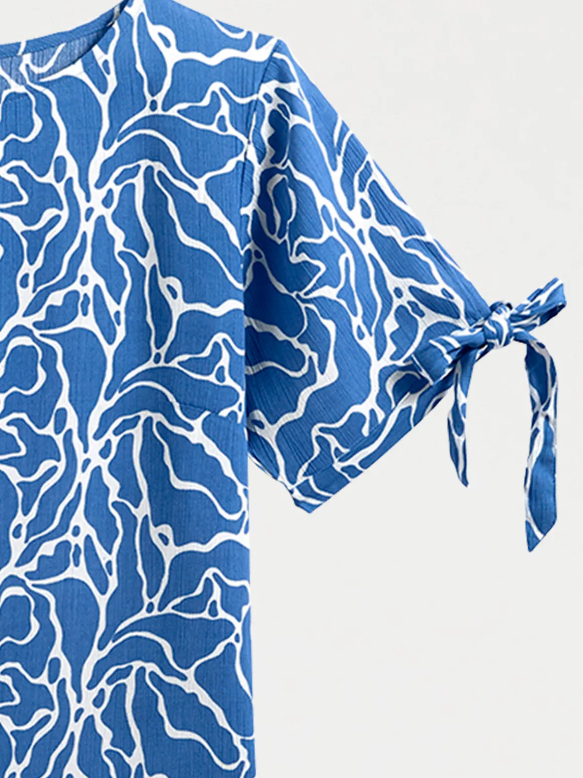 Blouse imprimée noeuds manches femme