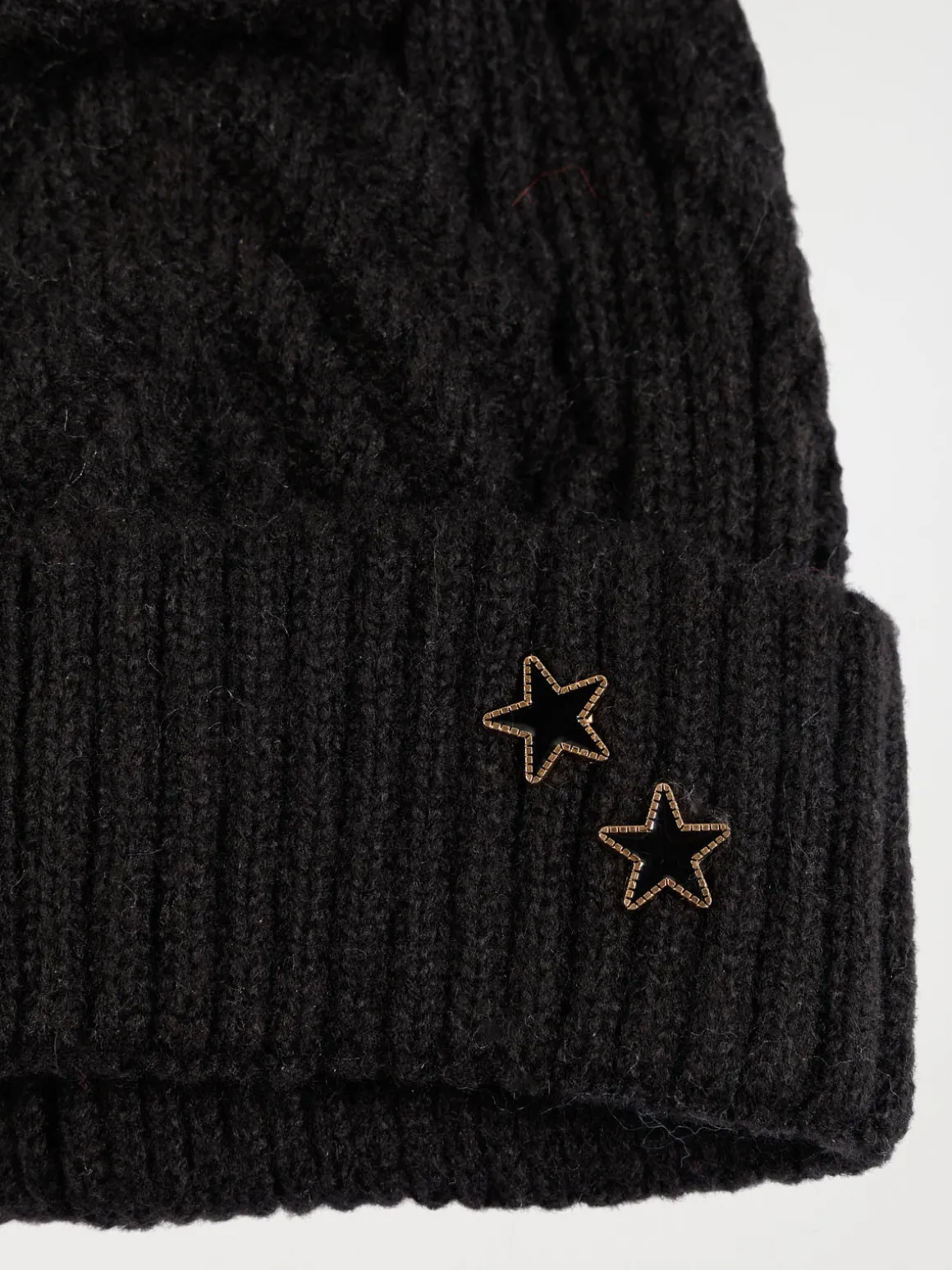 Bonnet noir torsadé pompon fille