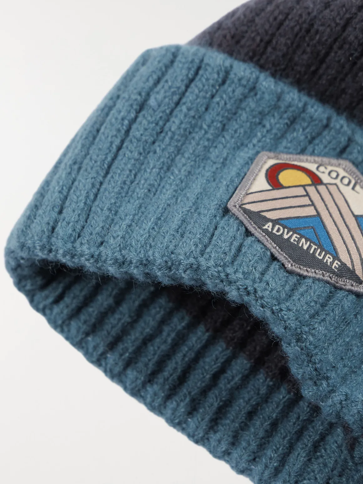 Bonnet tricolore pompon garçon