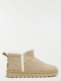 Boots coloris beige femme (36-41)