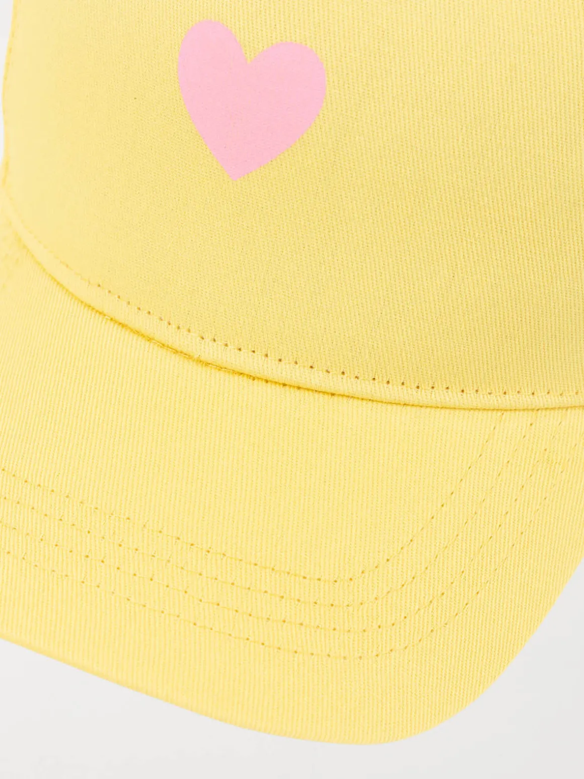 Casquette jaune clair coeur rose fille