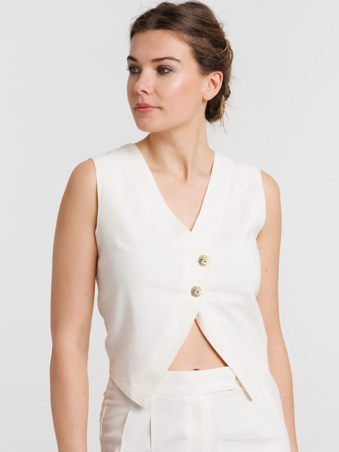 Gilet boutonné sans manches femme