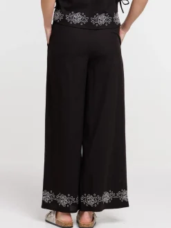 Pantalon femme noir fleurs brodées