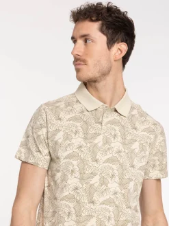 Polo motif feuille tropicale homme