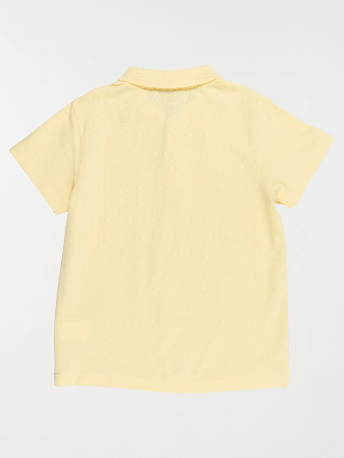 Polo uni jaune doux garçon (3-12A)