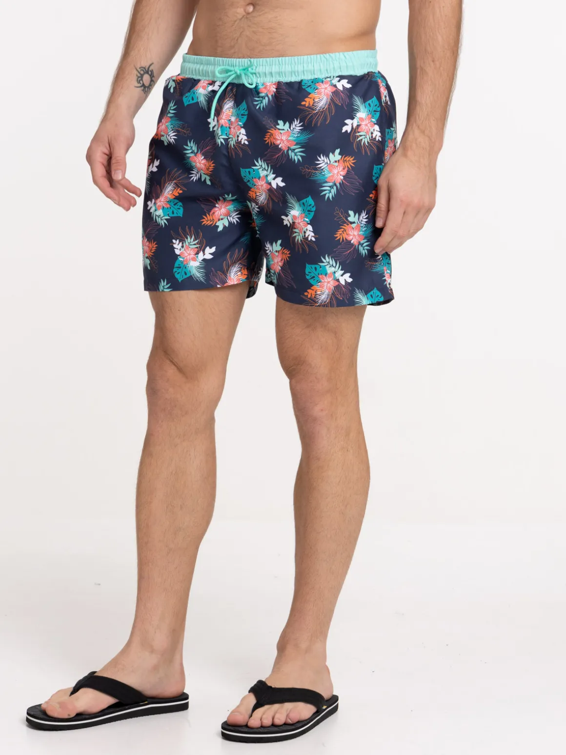 Short de bain motif feuillage homme