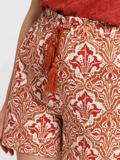 Short imprimé liens pompons femme