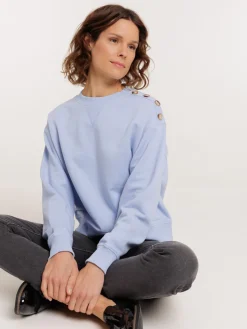 Sweat boutons épaule femme