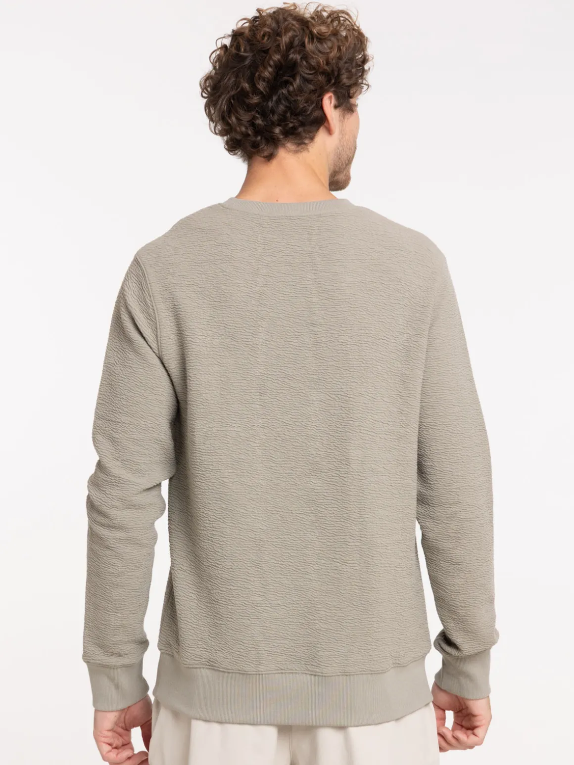 Sweat uni motif poitrine homme