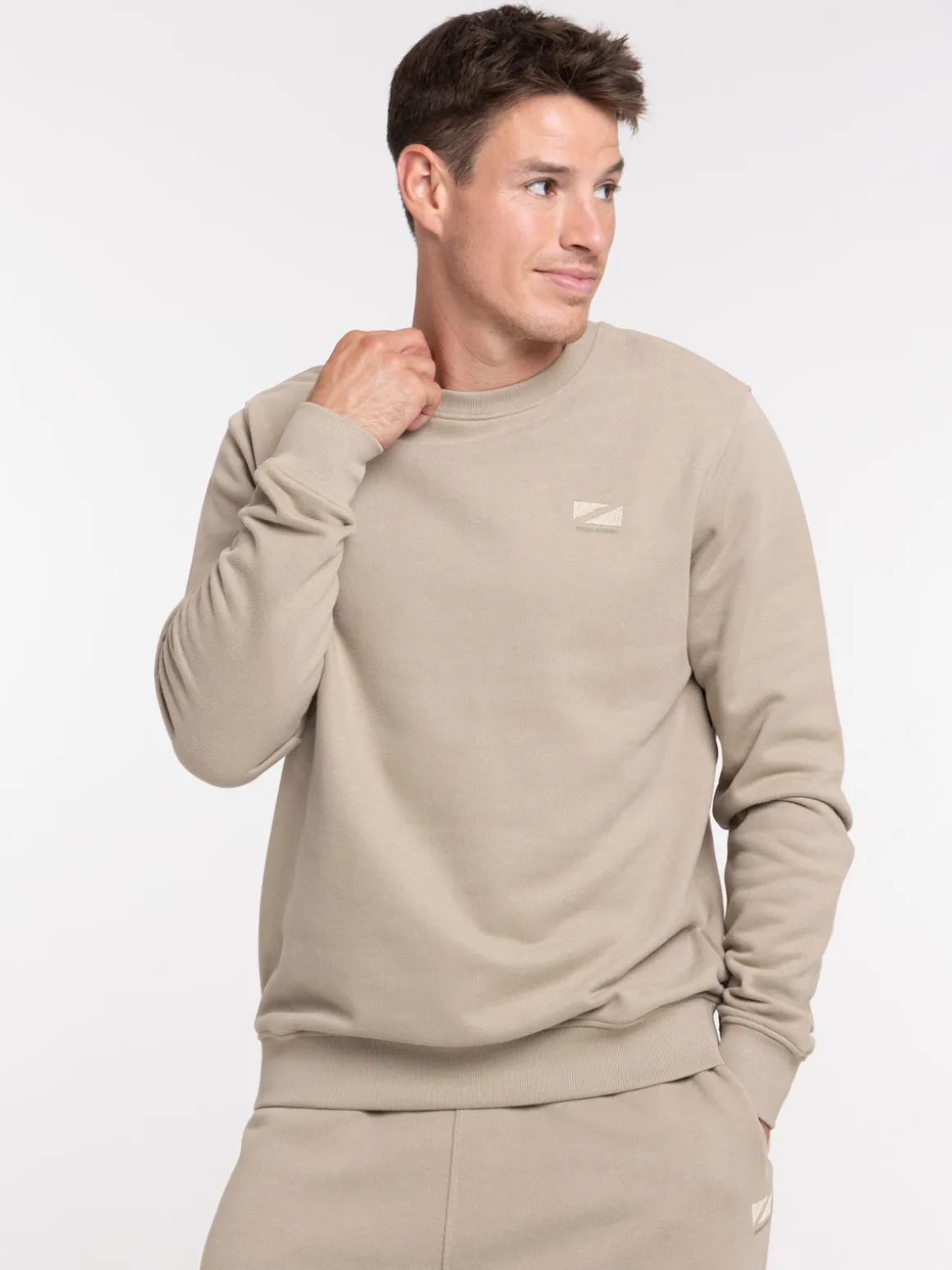 Sweat uni motif poitrine homme