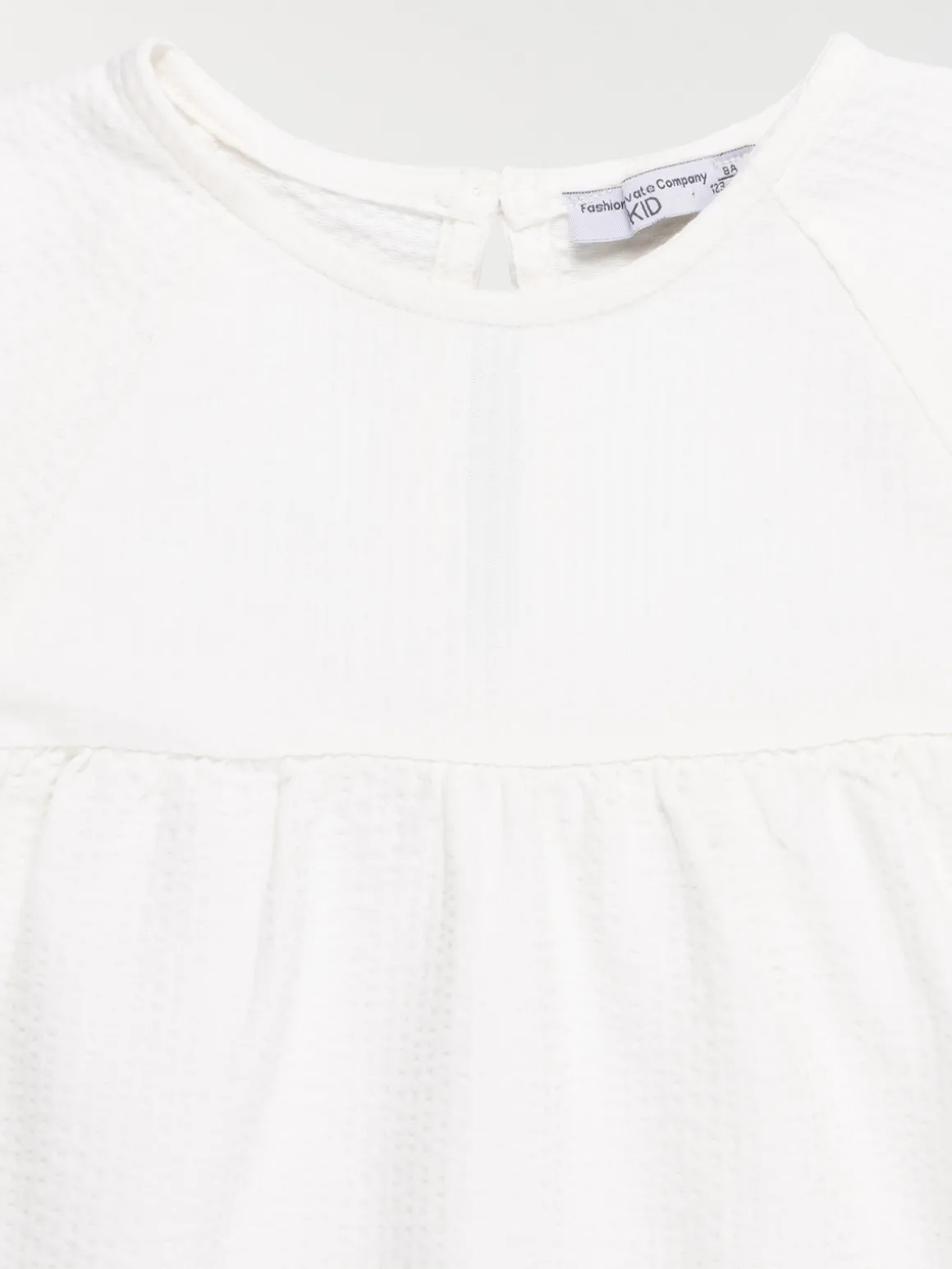 Tee-shirt écru bouton dos fille (3-12A)