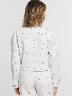 Veste courte écru à motif femme