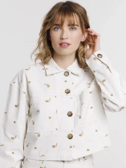 Veste courte écru à motif femme
