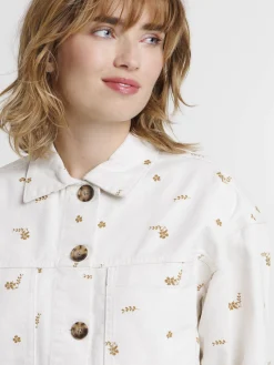 Veste courte écru à motif femme